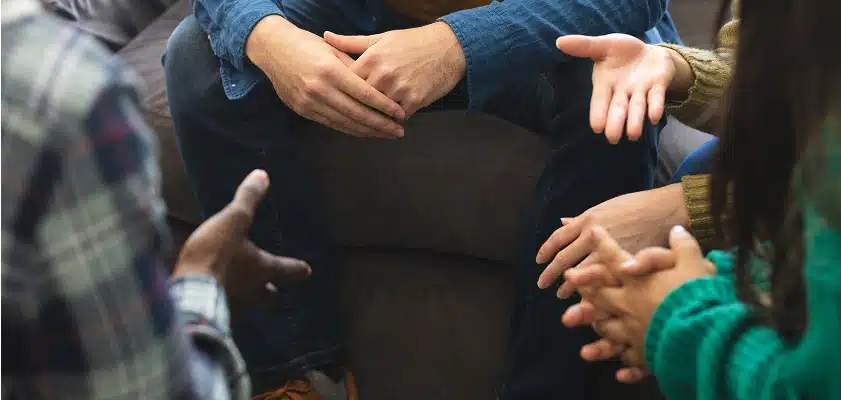 Family gathered with a professional interventionist — staging a compassionate addiction intervention in Orange County